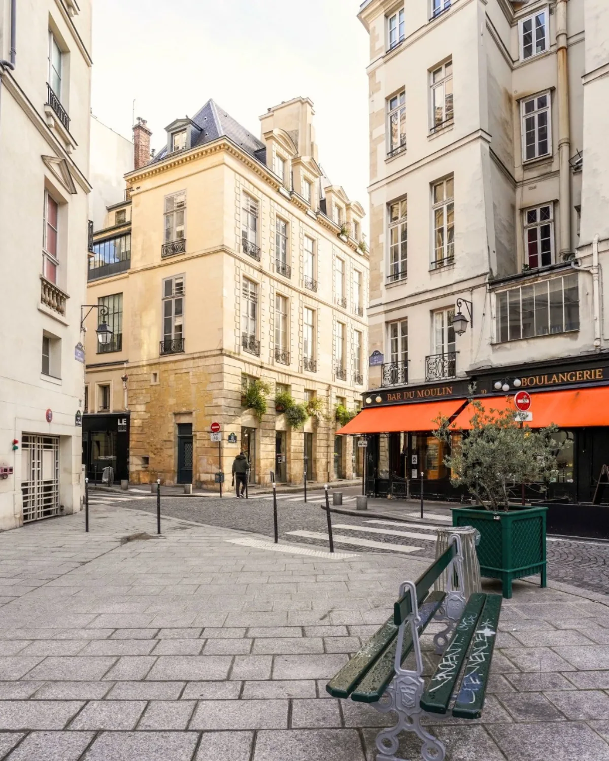 A cobbled square with a bakery and a cafe terrace, Paris 2nd arrondissement