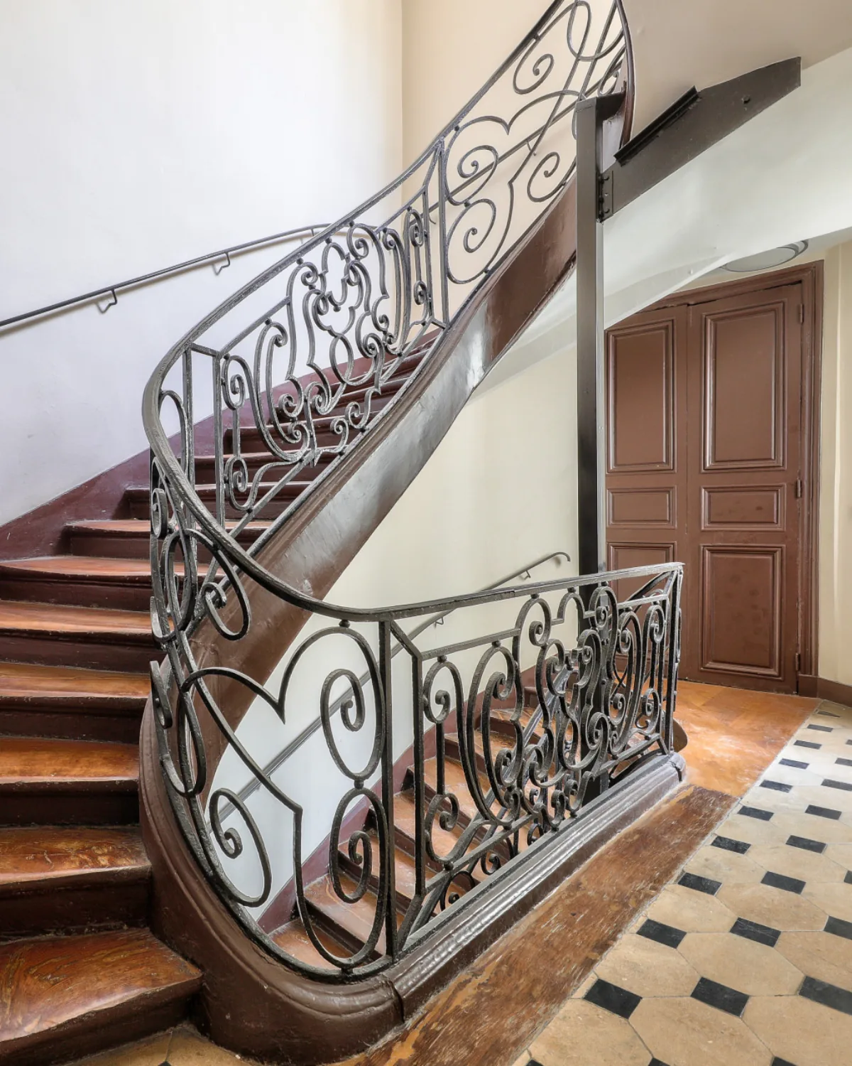 An old stairwell with a wrought-iron banister, Paris 2nd arrondissement